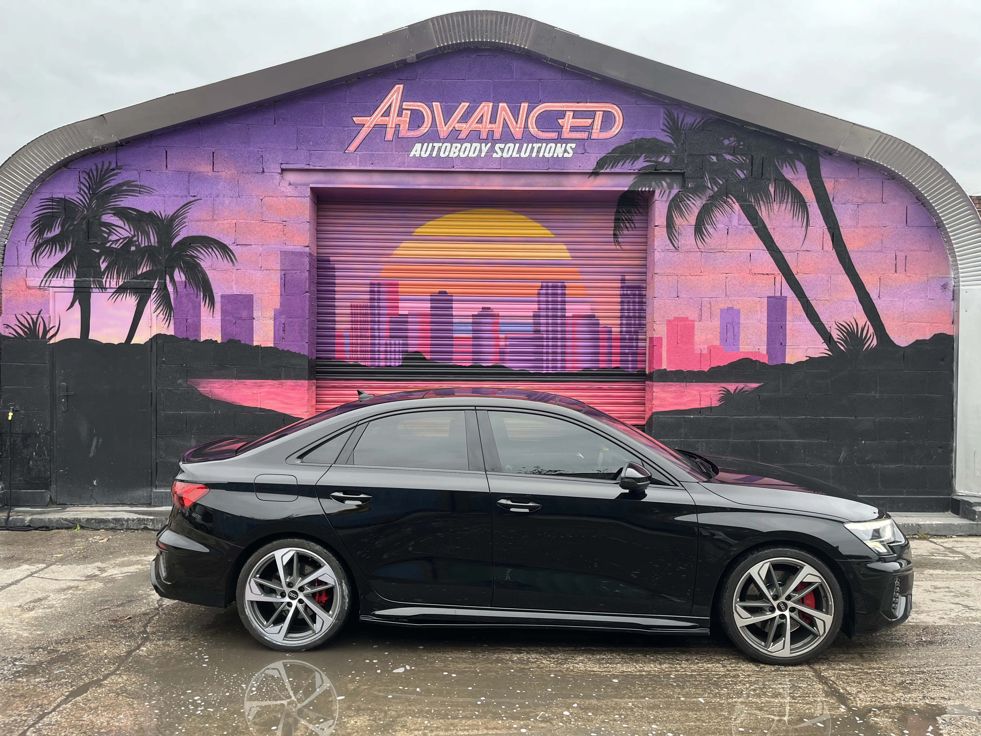 Detailed paint correction result on a car panel