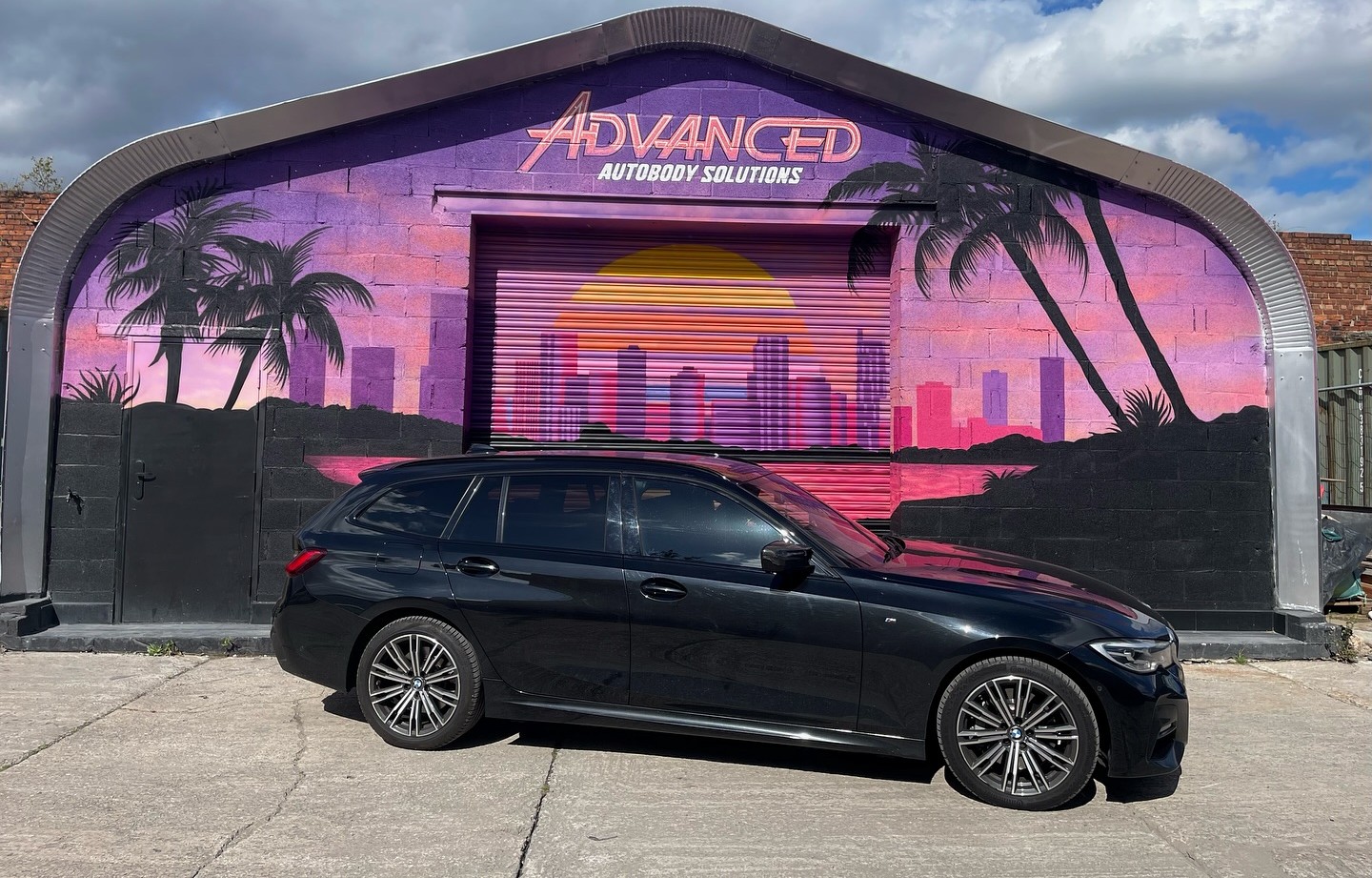 Black vehicle after professional autobody detailing